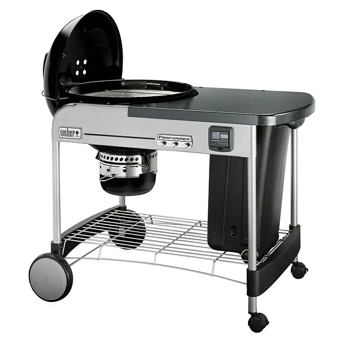 Weber Barbacoa de carbón Performer premium GBS 57 - Diámetro de la superficie de la parrilla: 57 cm, Negro - Barbacoa de carbón Weber Performer con encendido de gas Touch-N-Go y temporizador digital en negro. Ideal para los amantes de la parrilla.