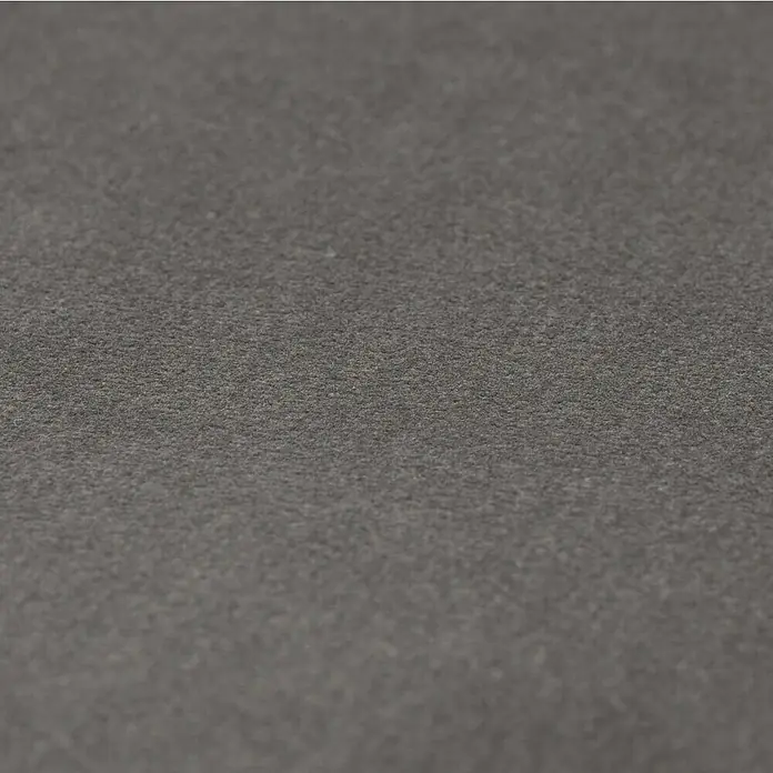 Fllow Wandpolster-Set Velvet A2 - 300 x 120 cm, Anthrazit - Nahaufnahme eines strukturierten, grauen Textilmaterials. Ideal für Hintergründe und Texturen.
