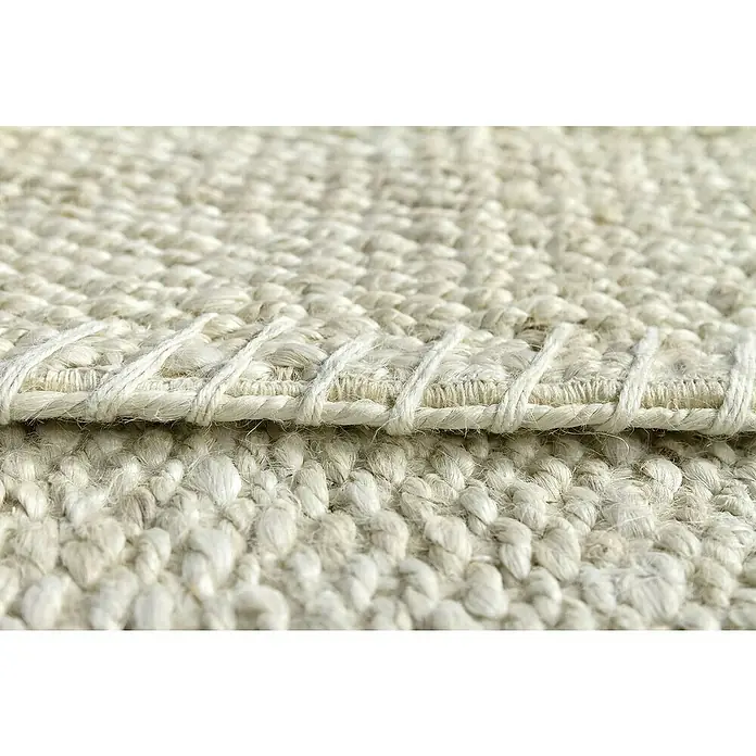 Alfombra de yute Córdoba - Blanco, 170 x 120 cm, 100% yute - Primer plano de una alfombra tejida, mostrando la textura y el detalle del borde.