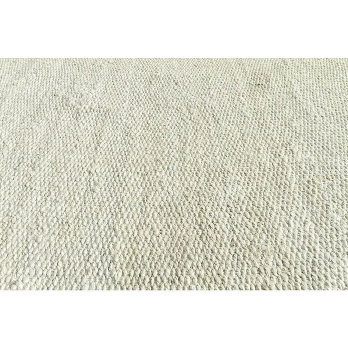 Alfombra de yute Córdoba - Blanco, 170 x 120 cm, 100% yute - Primer plano de una alfombra tejida de color beige, destacando una textura cálida y orgánica, ideal para un hogar acogedor.