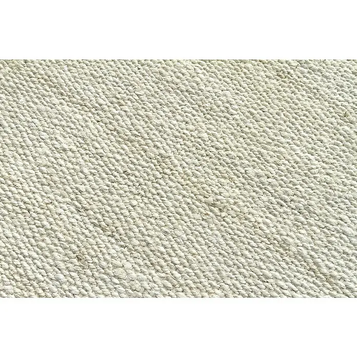 Alfombra de yute Córdoba - Blanco, 170 x 120 cm, 100% yute - Primer plano de una alfombra beige tejida. La textura es rugosa y natural, perfecta para crear un ambiente acogedor en tu salón.