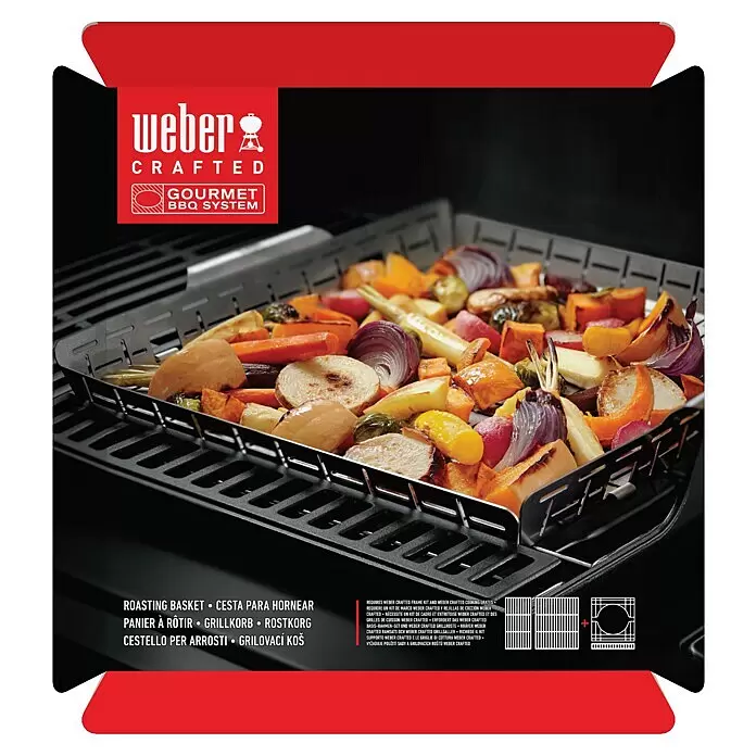 Weber Crafted Cesta para barbacoa - L x An x Al: 41 x 43 x 5 cm, Acero inoxidable - Una cesta asadora metálica Weber Crafted, llena de coloridas verduras asadas, sobre una parrilla.