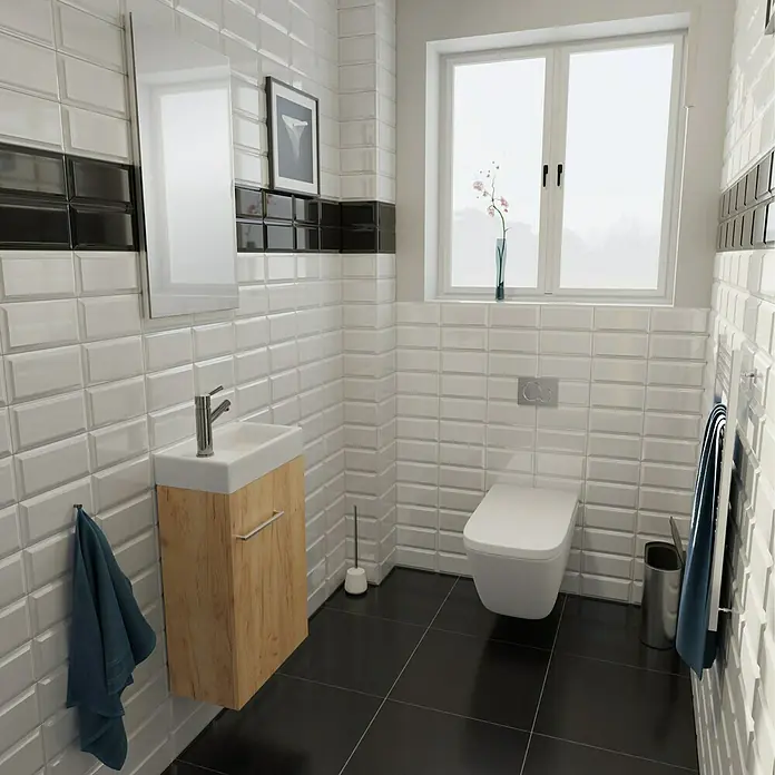 Camargue Espacio Einbauwaschbecken Mini22 x 40 cm, Weiß - Badezimmerinterieur mit Toilette, Waschbeckenunterschrank und Handtuch. Helle Fliesen und dunkler Boden sorgen für einen modernen Look.