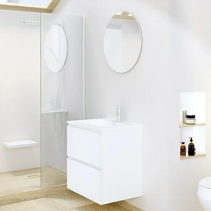Artysan Conjunto de mueble de baño Basic 2C - Ancho: 60 cm, Ancho total del mueble de baño: 60 cm, Blanco, Mate, 3 pzs. - La imagen muestra un moderno mueble de lavabo blanco con dos cajones, un espejo redondo y una ducha al fondo.