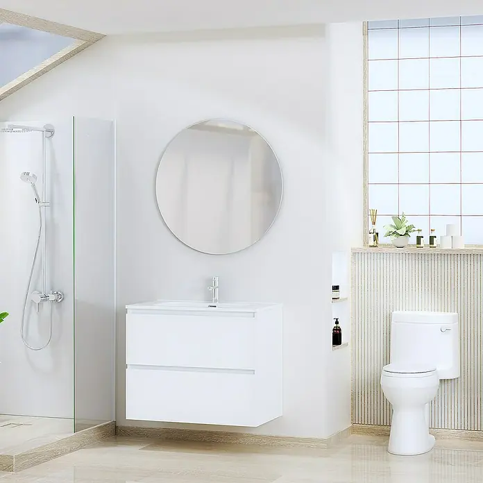 Artysan Conjunto de mueble de baño Basic 2C - Ancho: 80 cm, Ancho total del mueble de baño: 80 cm, Blanco, Mate, 3 pzs. - Imagen que muestra un baño moderno con un mueble de lavabo blanco, un espejo redondo y un inodoro. Líneas limpias e iluminación brillante.