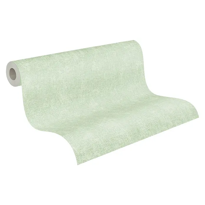 A.S. Création Hygge 2 Vliestapete - Grün/Schwarz, Uni, 10,05 x 0,53 m - Eine Rolle hellgrüner Tapete mit einer subtilen Textur, die sich abrollt und einen sanften Schwung zeigt. Ideal für die Wandgestaltung.