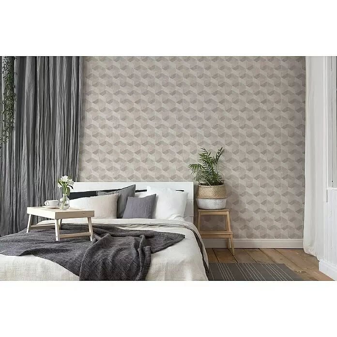 A.S. Création Titanium 3 Vliestapete 3D-Effekt - Creme, 3D-Optik, 10,05 x 0,53 m - Geometrisch gemusterte Tapete in Beige- und Grautönen an einer Schlafzimmerwand.