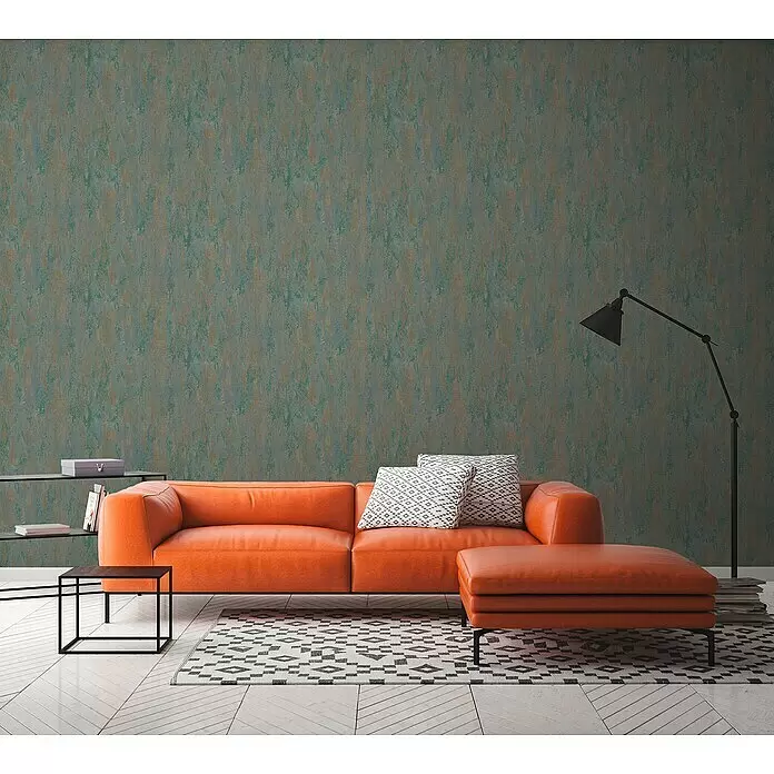 A.S. Création Trendwall 2 Vliestapete Rost - Rostiges Türkis, Metalloptik, 10,05 x 0,53 m - Strukturierte, türkisgrüne Tapete mit abstraktem Muster an einer Wand im modernen Wohnzimmer.