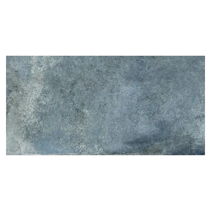 Feinsteinzeugfliese Blue Ocean - 59,7 x 119,7 cm, Blau, Matt - Das Bild zeigt eine graue Betonoberfläche mit einer leicht unebenen Textur. Die Oberfläche wirkt industriell und robust.