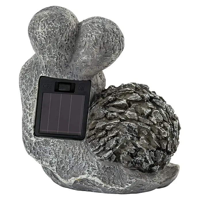 BAUHAUS Solar-Dekoleuchte - 0,06 W, L x B x H: 14 x 7 x 12,5 cm, Grau, IP44, Schnecke - Nahaufnahme einer dekorativen Steinfigur mit Solarpanel und Schalter, ideal für den Garten.