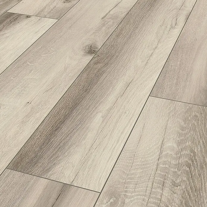 LOGOCLIC Designboden Element Flex - Eiche Alexia, Landhausdiele, 1.288 x 239 x 7 mm - Nahaufnahme von Laminatboden mit Holzmaserung in verschiedenen Grautönen, ideal für moderne Innenräume und langlebige Bodengestaltung.