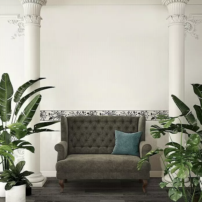 A.S. Création Only Borders 11 Tapetenborte Blume - Schwarz/Weiß, 5 x 0,13 m, Selbstklebefolie - Graues getuftetes Zweisitzer-Sofa mit blauem Kissen, in einem eleganten Raum.