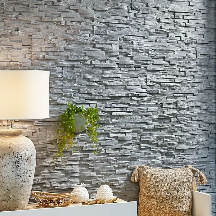 Panel de pared Benevento - 6 ud., 19 x 57 cm, Gris - Primer plano de una pared con paneles de piedra grises, que combinan estética moderna y rústica. Perfecto para interiores elegantes.