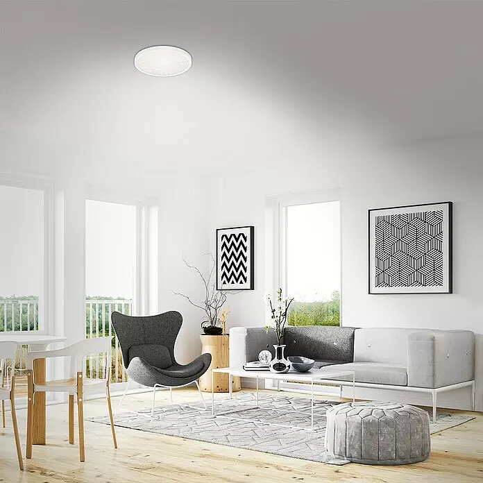 Briloner LED-Deckenleuchte rund - 18,5 W, Ø x H: 28 x 4 cm, Weiß, Neutralweiß - Runde weiße LED-Deckenleuchte mit funkelndem Diffusor, beleuchtet ein modernes Wohnzimmer.