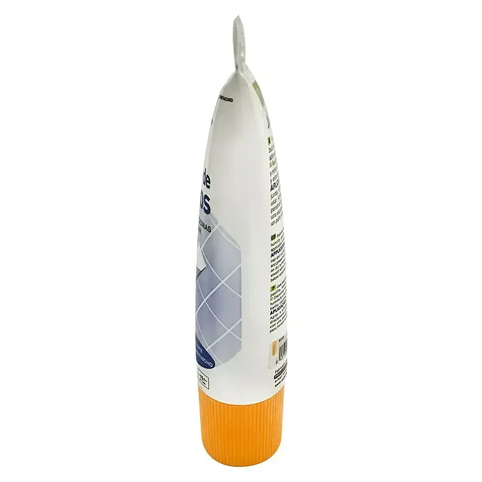 Masilla Juntas de Azulejos - Beige, 200 ml - Primer plano de un tubo de relleno de juntas con tapón naranja, ideal para reparaciones precisas y sellado en casa.