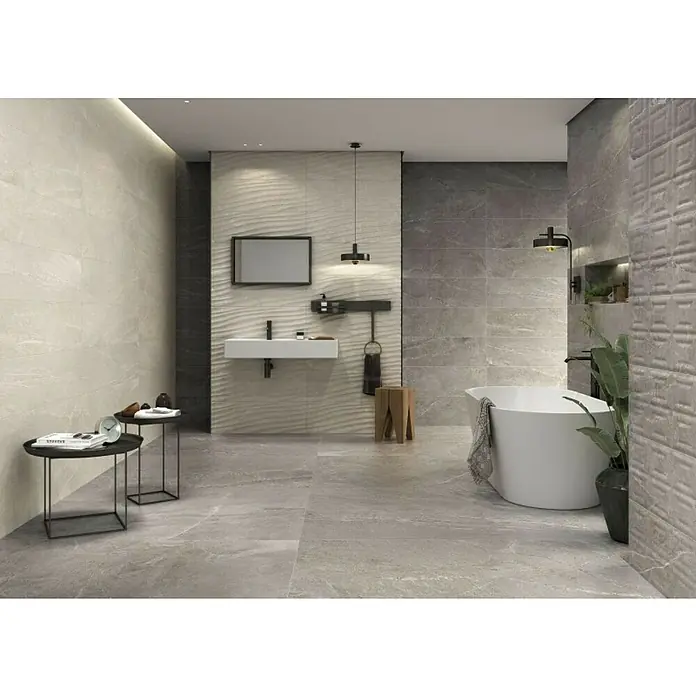 Halcón Revestimiento de pared Tempo Curve - 30 x 90 cm, Natural, Mate, Rectificado - Elegante diseño de baño con elegantes azulejos grises, una bañera moderna y detalles minimalistas para un ambiente de lujo.