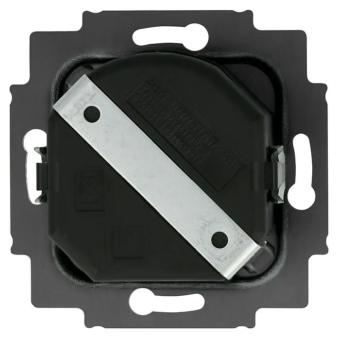 Busch-Jaeger LED-Dimmer 6523 U-102 - 230 V - Detailansicht eines Busch-Jaeger Elektro Geräteeinsatzes, der in einem dunklen Rahmen sitzt, mit einer Metallklammer über die Rückseite.