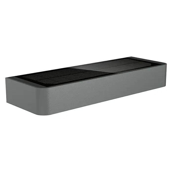 Steinel XSolar Solar-Außenwandleuchte XSOLAR SOL-O S anthrazit - 1,5 W, L x B x H: 24,2 x 9,1 x 5,3 cm, IP44 - Nahaufnahme einer rechteckigen, grauen Solarleuchte für den Außenbereich mit einem Solarmodul auf der Oberseite.