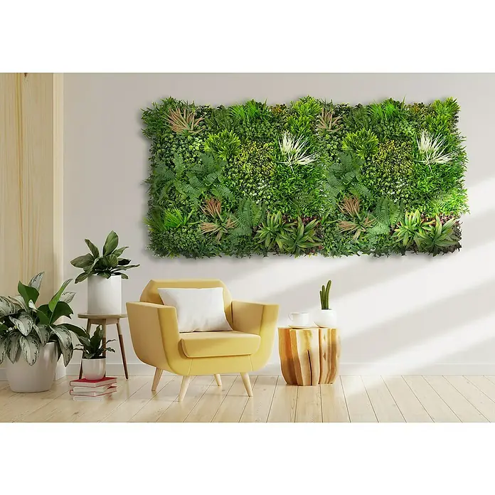 Faura Jardín vertical Madagascar - Plástico, L x An: 100 x 100 cm - Vegetación de pared sobre sillón y mesa. El panel de pared verde artificial añade un ambiente natural y elegante a la habitación.