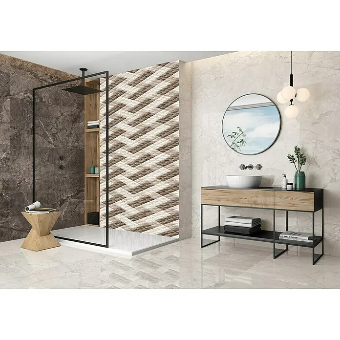 Pavimento porcelánico Gales - 60 x 120 cm, Ivory, Rectificado - Un baño moderno con azulejos de mármol, una ducha a ras de suelo y un tocador con espejo redondo y una llamativa lámpara colgante.
