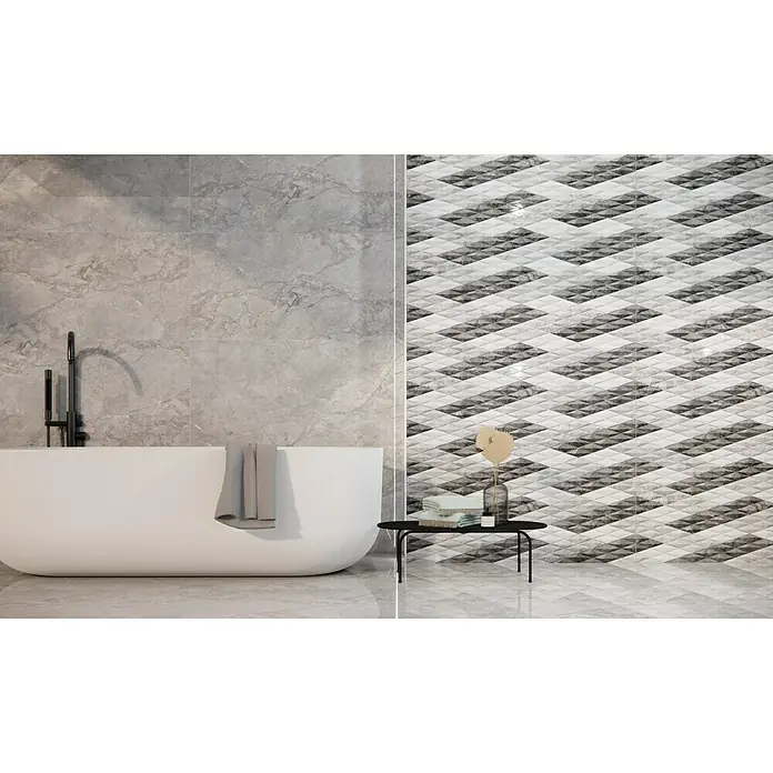 Pavimento porcelánico Gales - 60 x 120 cm, Gris, Rectificado - Un baño moderno con una bañera exenta y una pared con mármol gris y baldosas con estampados geométricos.