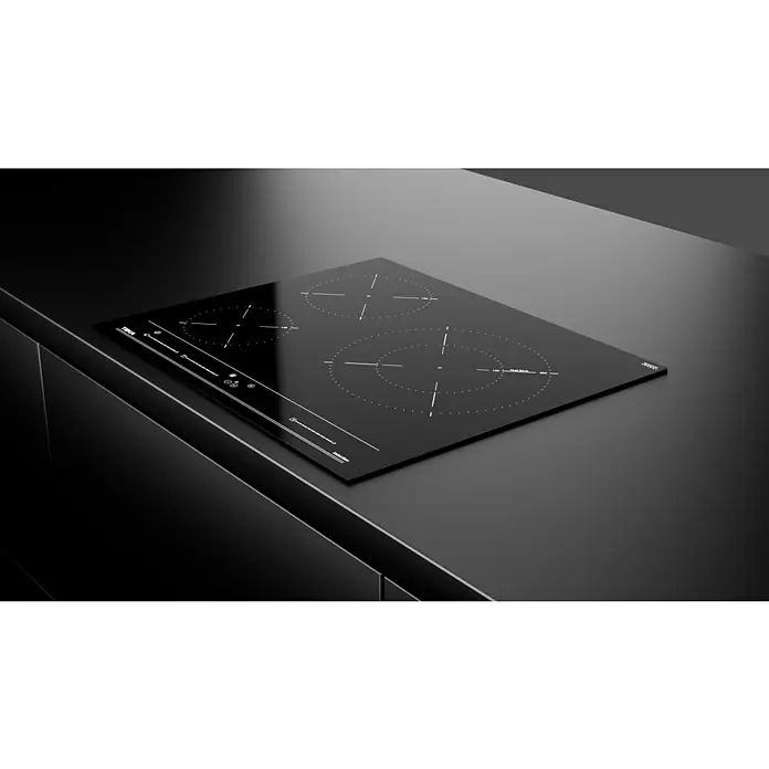 Teka Placa de cocción IBC63015 - An x L: 51 x 60 cm - Elegante placa de inducción negra con marcas de zona de cocción precisas, integrada en una encimera de cocina moderna.