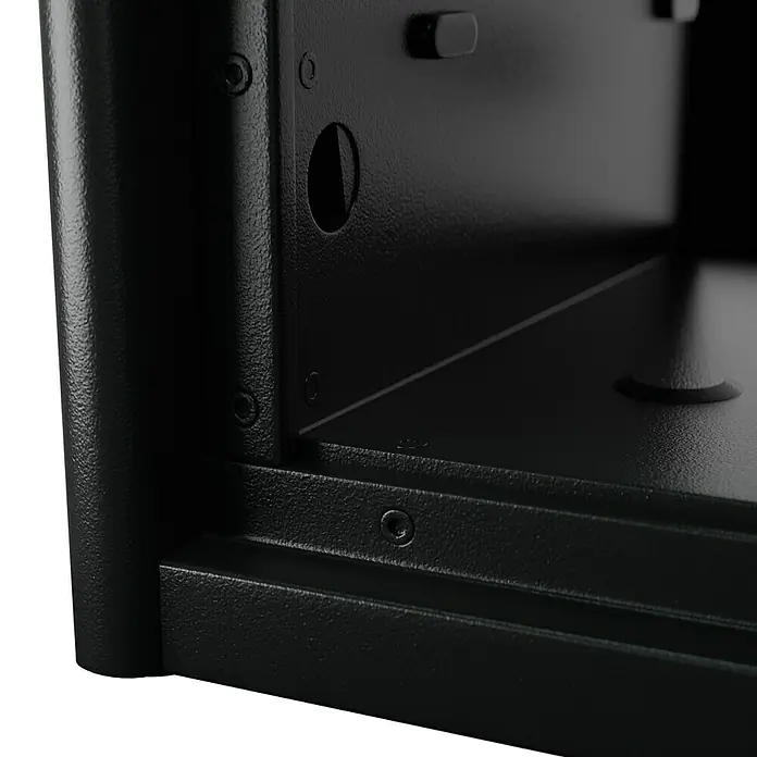 Burg-Wächter Möbeltresor Combi Line CL 440 E - Elektronisches Zahlenschloss, 445 x 495 x 560 mm, Schwarz - Nahaufnahme eines schwarzen Tresors mit Details wie Löchern und Schrauben, die die robuste Bauweise hervorheben.
