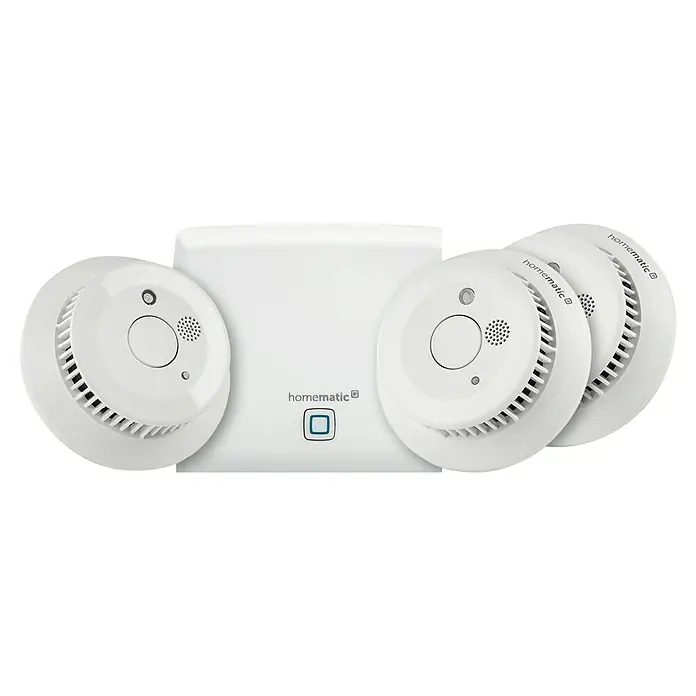 Homematic IP Starter-Set Rauchwarnmelder HmIP-SK4 - 1 x Access Point, 3 x Rauchmelder, 1 x Netzwerkkabel, 1 x Steckernetzteil, 6 x Batterie (fest verbaut), 1 x Deckenhalter, 1 x Montagezubehör - Abbildung des Homematic IP Smart Home Alarmsystems mit mehreren Rauchmeldern und einer Zentrale. Das System bietet Sicherheit für Ihr Zuhause.