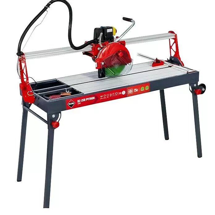 Rubi Cortador de azulejos eléctrico DC-250 Python 1200 - 1.100 W, Longitud de corte máx.: 1.210 mm, Profundidad de corte a 90 °: 90 mm - Sierra de azulejos eléctrica húmeda Rubi DC-250 PYTHON roja y gris con soporte, bomba de agua y cabezal de corte deslizante.