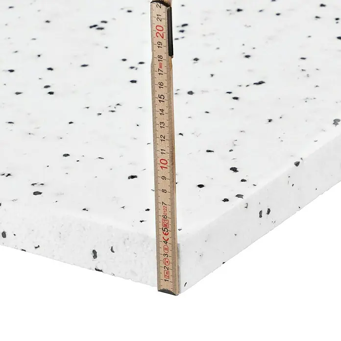 Mehrzweckdämmplatte DEO/WAB 040 - Stärke: 40 mm, Expandiertes Polystyrol (EPS), Wärmeleitstufe: 040 - Nahaufnahme einer weißen Arbeitsplatte mit schwarzen Sprenkeln, gemessen mit einem Zollstock, der eine Dicke von ca. 20 cm anzeigt.