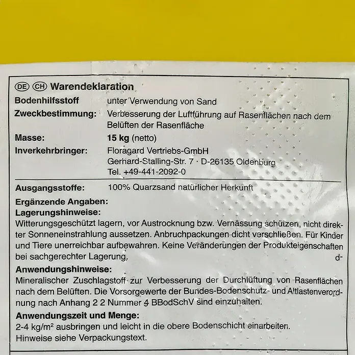 Floragard Rasensand - 15 kg - Abbildung des Etiketts einer Packung Rasen-Bodenhilfsstoff, der Sand enthält, zur Verbesserung der Luft auf Rasenflächen.