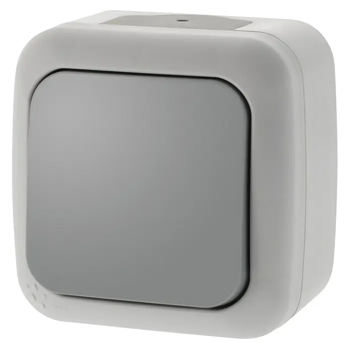 Siemens Delta IP54 Feuchtraumtaster SIE028653 - Grau, Aufputzmontage, IP54 - Nahaufnahme eines eckigen, grauen Wandschalter, ideal für moderne Wohnräume und einfache Bedienung.\n