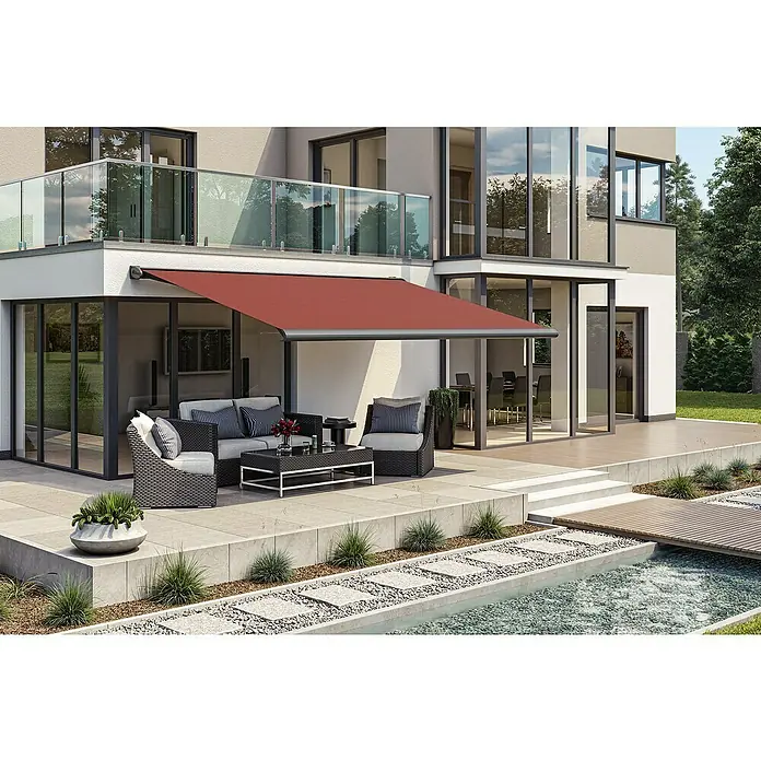 Solid Elements Vollkassettenmarkise Solid-S 2209 - Rot, Farbe Gestell: Anthrazitgrau, Breite: 4,5 m, Ausfall: 1,5 m - Diese Aufnahme zeigt eine Terrasse mit einer eleganten Markise, die Schatten spendet und zum Verweilen einlädt.