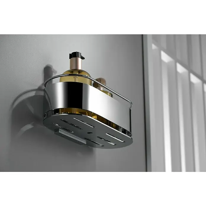 Imex Cesta de baño Anga - 12 x 28 x 10,3 cm, Acero inoxidable, Cromo - Un estante de ducha plateado brillante fijado a la pared de un baño, que contiene champú y otros artículos de baño.