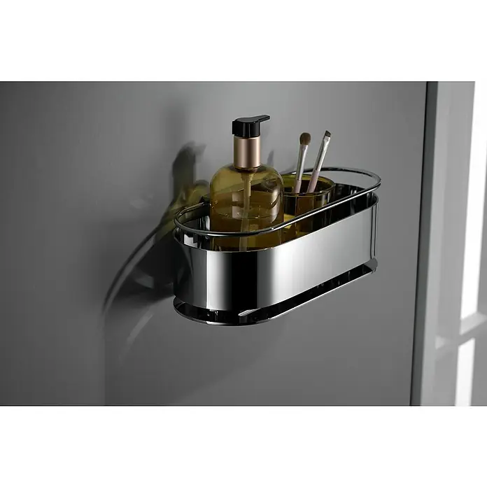 Imex Cesta de baño Anga - 12 x 28 x 10,3 cm, Acero inoxidable, Cromo - Esta foto muestra un estante de ducha cromado que contiene champú y cepillos, montado en una pared gris.