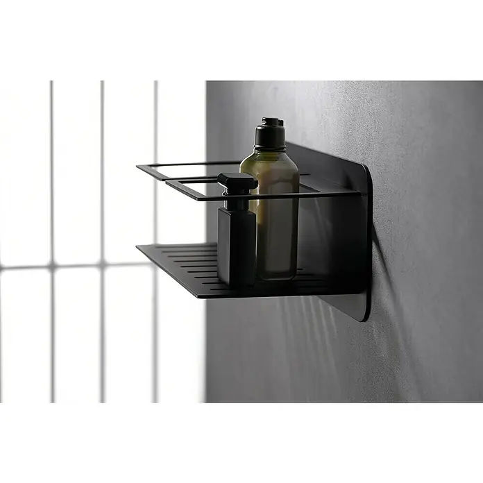 Imex Cesta de baño Iman - 12,7 x 36 x 13,5 cm, Acero inoxidable, Negro - Un estante negro con dos botellas. Un elegante accesorio de baño para guardar tus productos de cuidado personal.