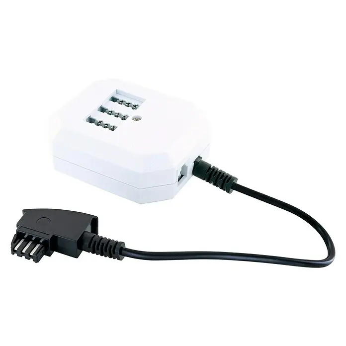 Schwaiger Telefon-Anschlussverteiler TAE - 4-fach, 0,2 m - Bild eines weißen Ladegeräts mit Kabel und Stecker, das auf einem schwarzen Hintergrund liegt. Kompaktes Design für schnelles Aufladen.