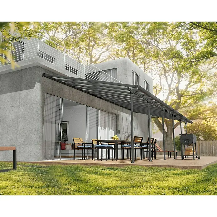 Solid Elements Terrassenüberdachung Martina - B x T: 1.031 x 400 cm, Anthrazitgrau, Polycarbonat, Transparent - Bild einer modernen Terrassenüberdachung mit stilvollem Design, die einen Essbereich im Freien vor Sonne und Regen schützt.\n