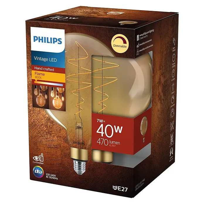 Philips Bombilla LED Vintage Gold - E27, Intensidad regulable, Ámbar, 470 lm, 7 W, Redonda - Primer plano del paquete de una bombilla LED Vintage de Philips, destacando su cálida luz de llama y diseño regulable.