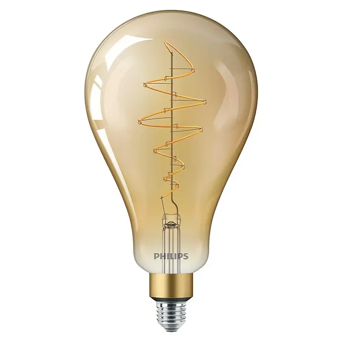 Philips Bombilla LED Vintage Gold - E27, Intensidad regulable, Ámbar, 470 lm, 7 W, Globo - Primer plano de una bombilla decorativa Philips con acabado dorado y filamento en espiral sobre un fondo negro.