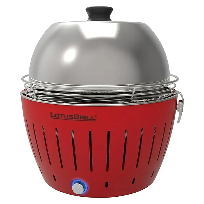 LotusGrill Grillhaube S - Passend für: Lotusgrill Holzkohlegrill S - LotusGrill Holzkohlegrill mit Deckel. Der Grill ist rot und hat ein Edelstahlgehäuse. Perfekt für gemütliche Grillabende im Freien.