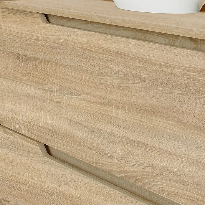 Artysan Conjunto de mueble de baño Zeus Top - Ancho: 60 cm, 4 pzs., Natural, Mate - Primer plano de un mueble de madera con cajones y un acabado liso de color claro. El mueble tiene una estética moderna y sencilla.