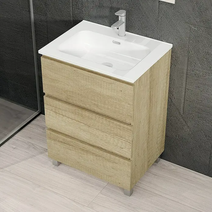 Artysan Conjunto de mueble de baño Patri - Ancho: 60 cm, 3 pzs., Nature, Mate - La imagen muestra un mueble de baño con tres cajones y un lavabo sobre encimera blanco. El mueble tiene un acabado de madera clara.