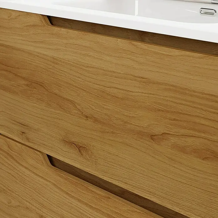 Artysan Conjunto de mueble de baño Zeus - Ancho: 60 cm, 3 pzs., Teka, Mate - Primer plano de un mueble de baño de madera clara con cajones y una encimera de baño blanca, mostrando el producto.