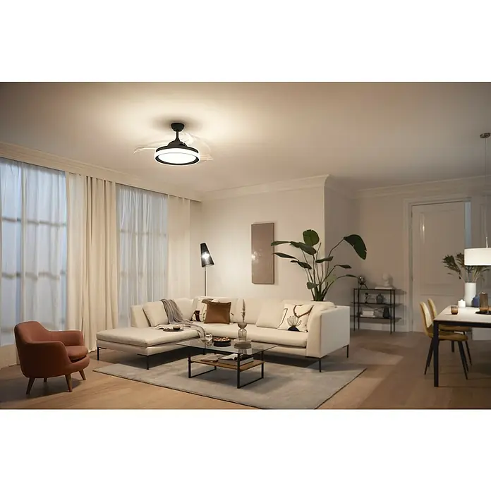 Philips Ventilador de techo Bliss Negro - Transparente, 51 cm, 28 W - 35 W, Blanco cálido - Interior luminoso que muestra un moderno ventilador de techo con iluminación integrada, mejorando el ambiente y la circulación del aire.