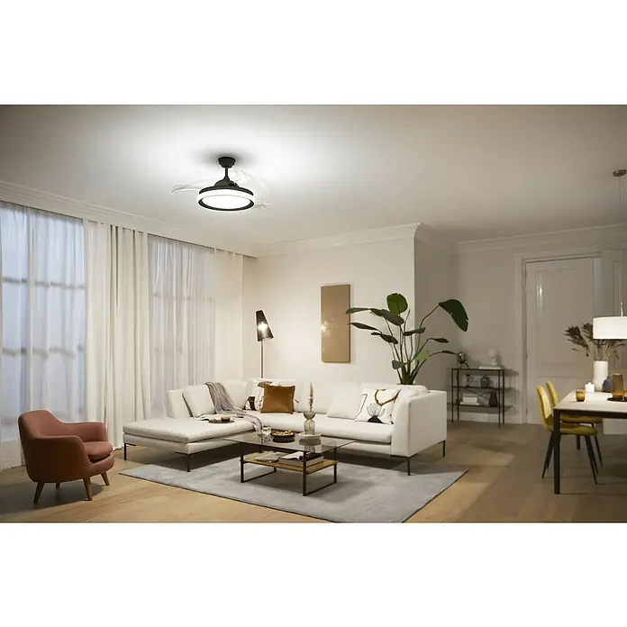 Philips Ventilador de techo Bliss Negro - Transparente, 51 cm, 28 W - 35 W, Blanco cálido - Una sala de estar moderna con un ventilador de techo con iluminación integrada que proporciona circulación de aire e iluminación brillante.