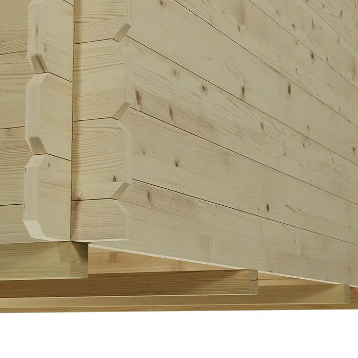 SKAN HOLZ Gartenhaus Como 2 - Außenmaß inkl. Dachüberstand (B x T): 340 x 350 cm, Holz, Natur - Detailaufnahme einer Holzwand mit Nut-und-Feder-Verbindung, die die robuste Bauweise und natürliche Ästhetik hervorhebt.