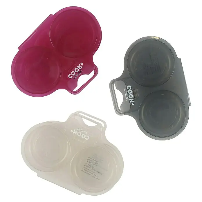 Set de cuece huevos doble para microondas - 2 ud., Específico para: Microondas - Tres cocedores de huevos de Cook Concept en rosa, gris y blanco sobre un fondo negro. Prácticos ayudantes de cocina para huevos perfectos.