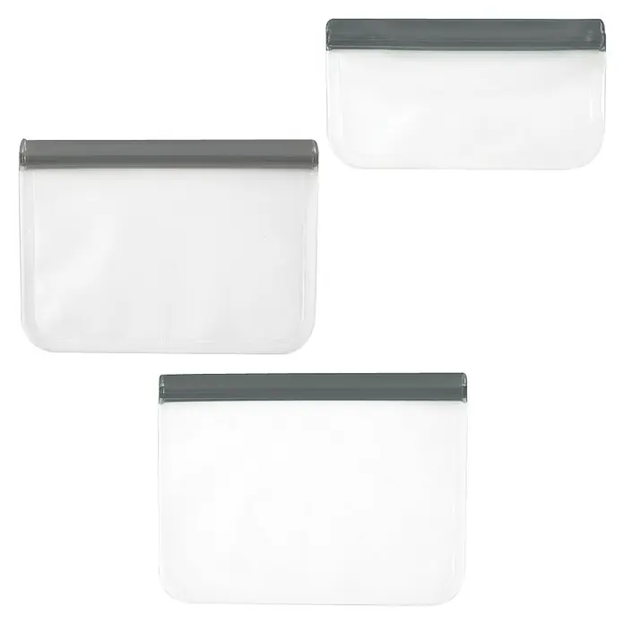 Set de bolsas de vacío reutilizables - 3 ud., Plástico - Tres bolsas de almacenamiento reutilizables transparentes con cierres grises. Perfectas para guardar alimentos o artículos esenciales de viaje.