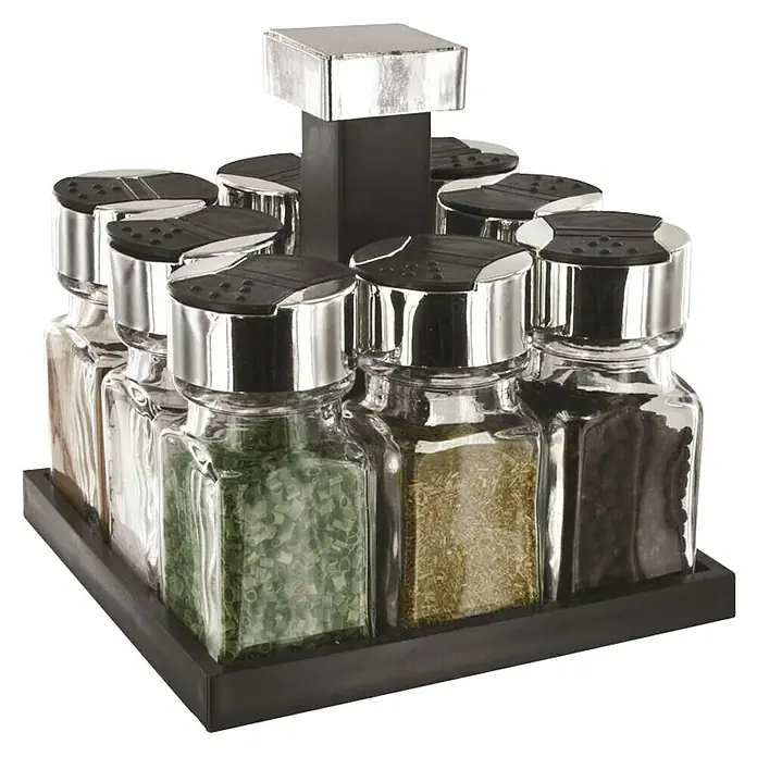 Especiero giratorio - Específico para: 8 Botes, 100 ml - Un especiero giratorio con ocho tarros de vidrio llenos de hierbas y especias variadas, ideal para la organización de la cocina.